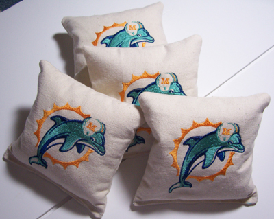 pillow with Miami Dolphins machine embroidery design