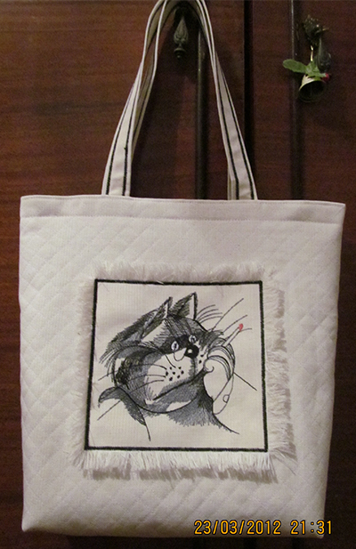 embroidered bag with cat 