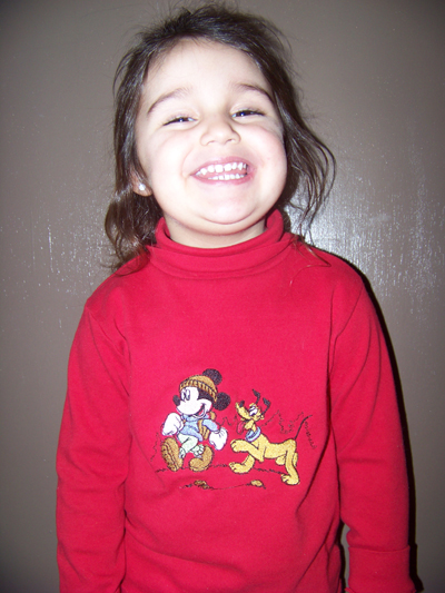 grand daughter wearing her Mickey Mouse shir