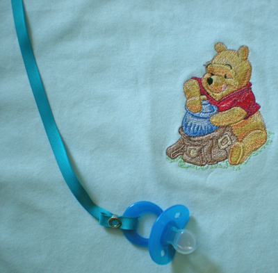 winnie pooh with bag machine embroidery design