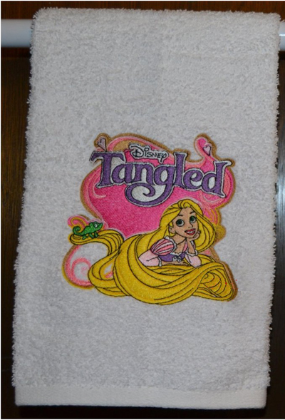 Towel embroidered with tangled design