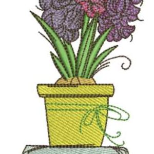Flowers in vase at table embroidery design