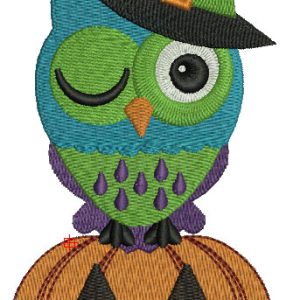 Owl sitting on a pumpkin embroidery design